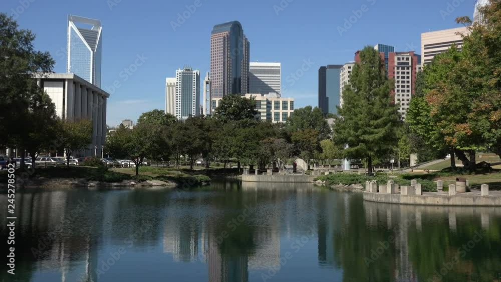 Charlotte skyline reflected in water, NC, USA Charlotte skyline reflected in water, NC, USA