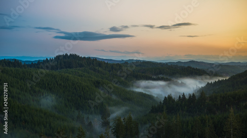 Mountain Overlook During Sunset with Fog
