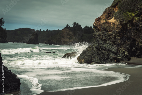Waves Splashing onto Beach During Storm
