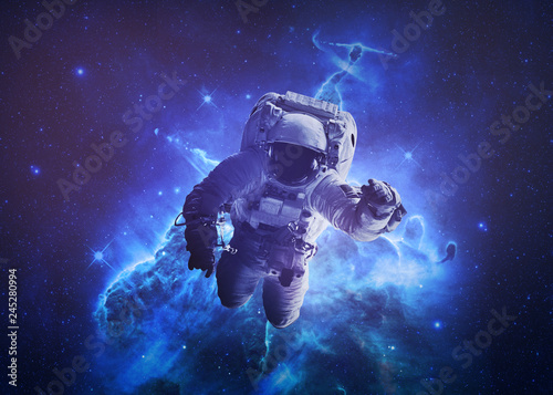 Fototapeta Naklejka Na Ścianę i Meble -  Astronaut Afloat - Elements of this Image Furnished by nASA