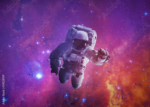 Schilderij op canvas Astronaut Afloat - Elements of this Image Furnished by nASA