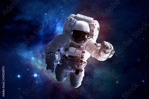 Fototapeta Naklejka Na Ścianę i Meble -  Astronaut Afloat - Elements of this Image Furnished by nASA