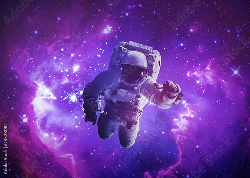 Fototapeta Naklejka Na Ścianę i Meble -  Astronaut Afloat - Elements of this Image Furnished by nASA