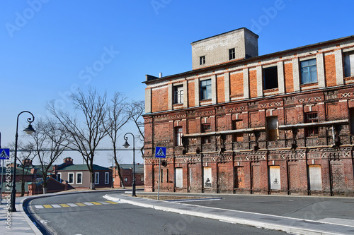 Vladivostok, Russia, January 19, 2019. Former artillery workshops on the Tsesarevich embankment in sunny winter weather