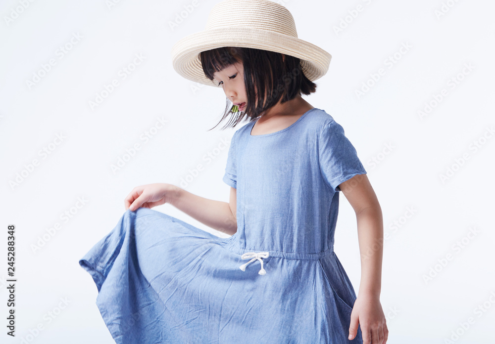 Cheerful Asian little girl on a white background Cheerful Asian little girl on a white background