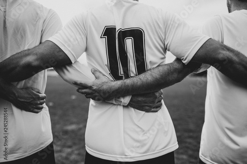 Football player wearing number 10 jersey © Rawpixel.com