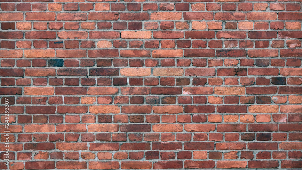 Naklejka premium A red brick background