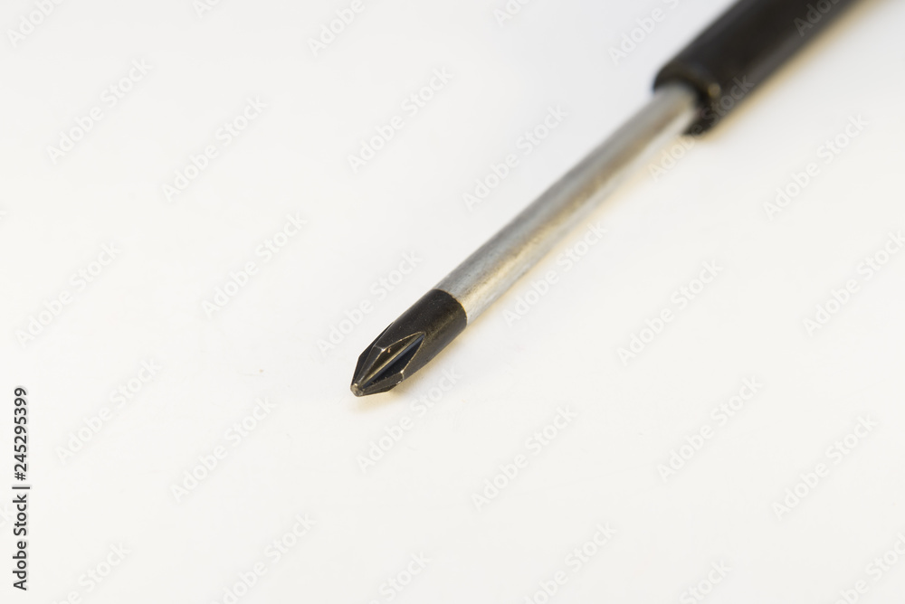 Black screwdriver isolated over the white background , set of several different foreshortenings Black screwdriver isolated over the white background , set of several different foreshortenings