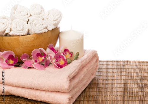 Spa still life with aromatic candles orchid flower and towel. - Image.