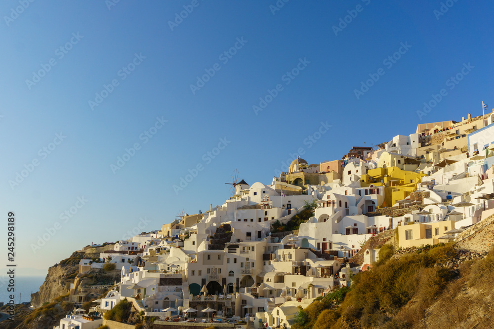 Beautiful landscape view from  Oia village, Santorini with clear blue sky