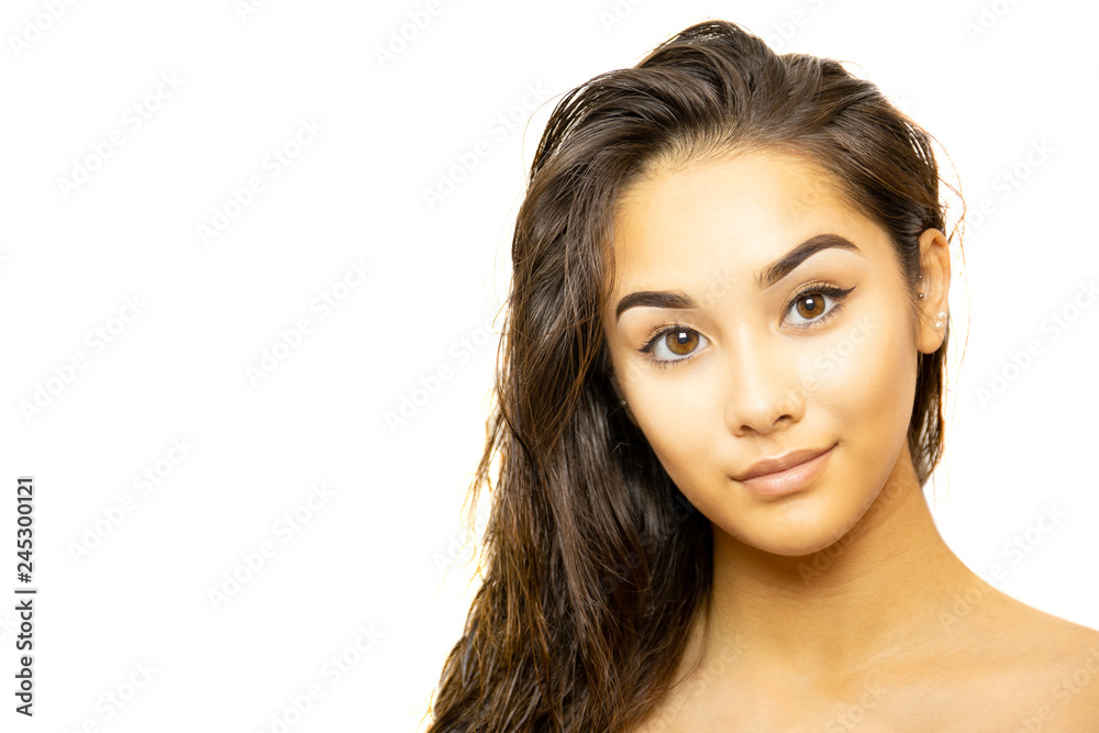 Mixed race young woman face portrait isolated on white background. Mixed race young woman face portrait isolated on white background.