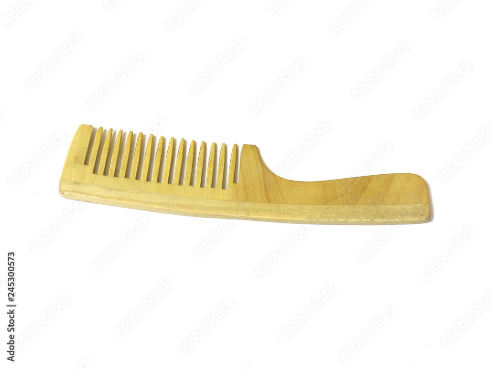 Wooden hairbrush on white isolated background Wooden hairbrush on white isolated background