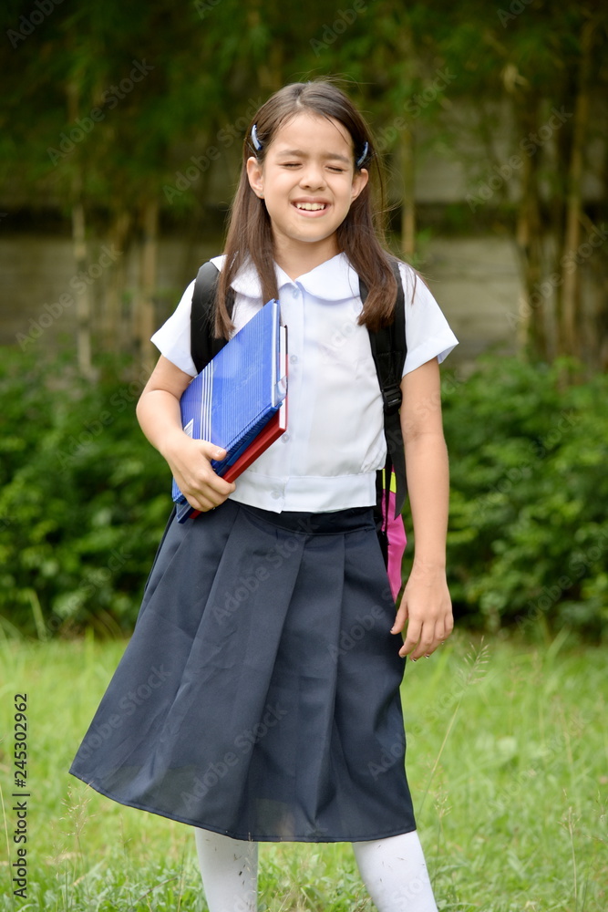 Asian Child Girl Student Under Stress With Notebooks Asian Child Girl Student Under Stress With Notebooks