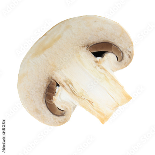 half of champignon isolated on white background