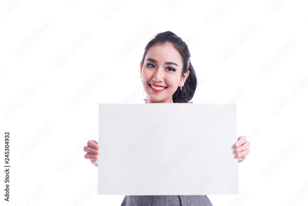 Portrait of young business woman smiling show white paper or label Applied for , brochure, mock up , blank card , poster . Casual dressed girl with advertising banner ,isolated on white in studio Portrait of young business woman smiling show white paper or label Applied for , brochure, mock up , blank card , poster . Casual dressed girl with advertising banner ,isolated on white in studio