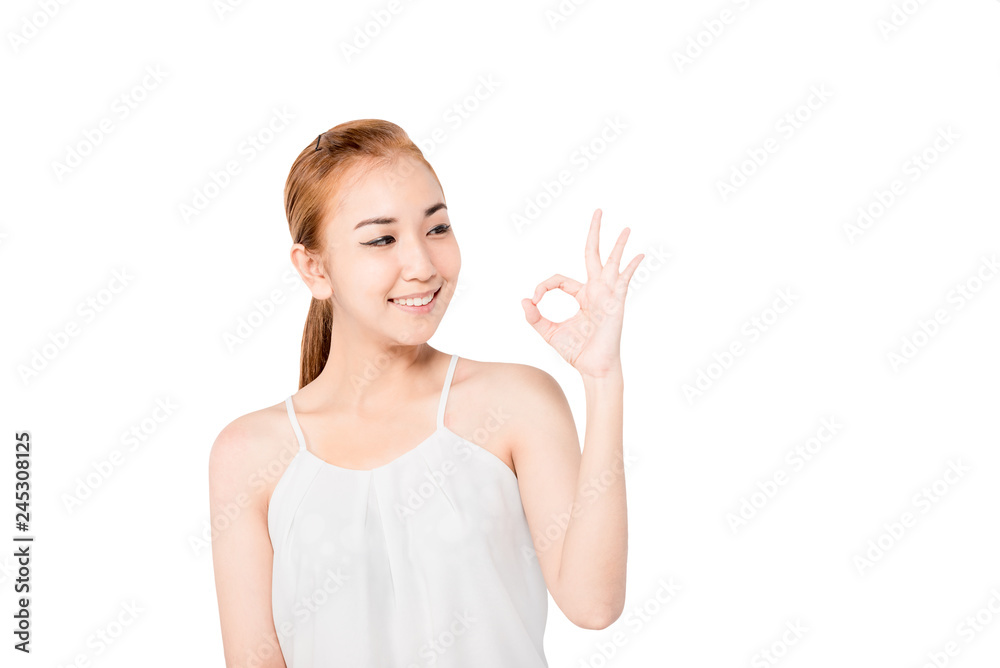 Closed up portrait of cheerful happy excited asian woman wearing a white casual and showing ok sign with beaming smile, clean skin and smooth straight blonde hair. isolated on white background Closed up portrait of cheerful happy excited asian woman wearing a white casual and showing ok sign with beaming smile, clean skin and smooth straight blonde hair. isolated on white background