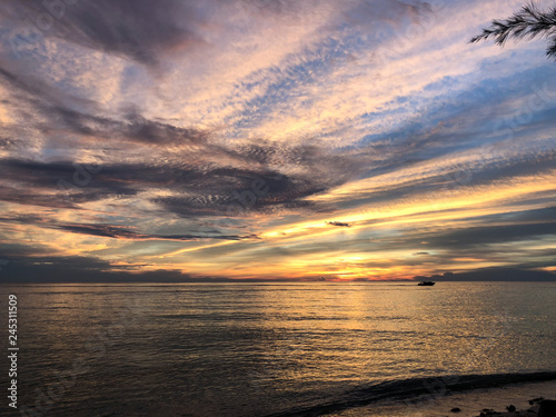 amazing sky at sunset  in derawan archipelago, borneo island photo