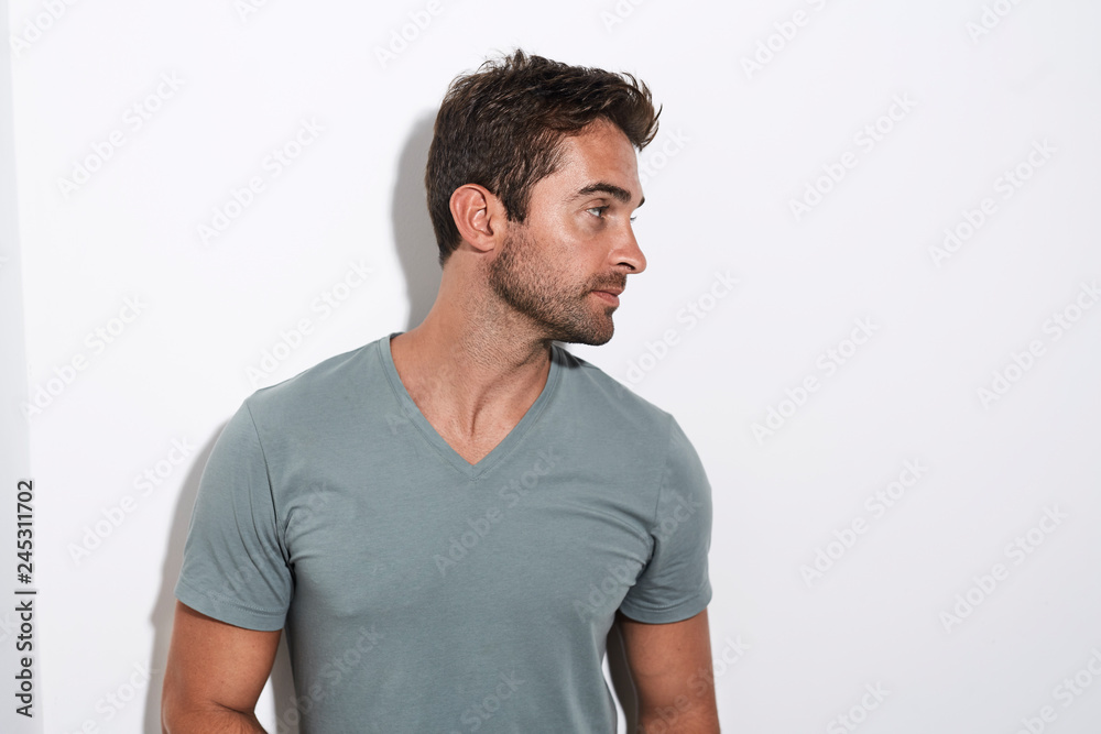 Handsome dude in grey, looking away