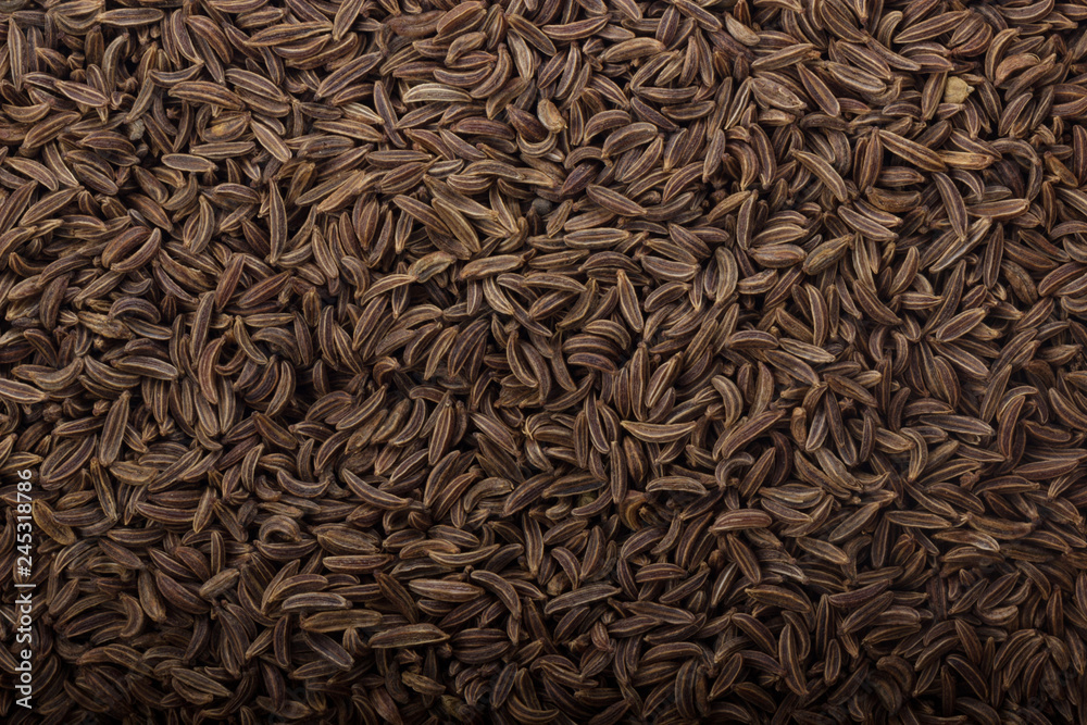 heap of cumin (caraway) background heap of cumin (caraway) background