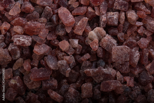 Kala namak background. black indian salt. photo