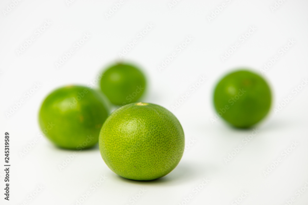 Limes with slices isolated on white background Limes with slices isolated on white background