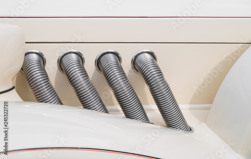 exhaust pipes on a classic car