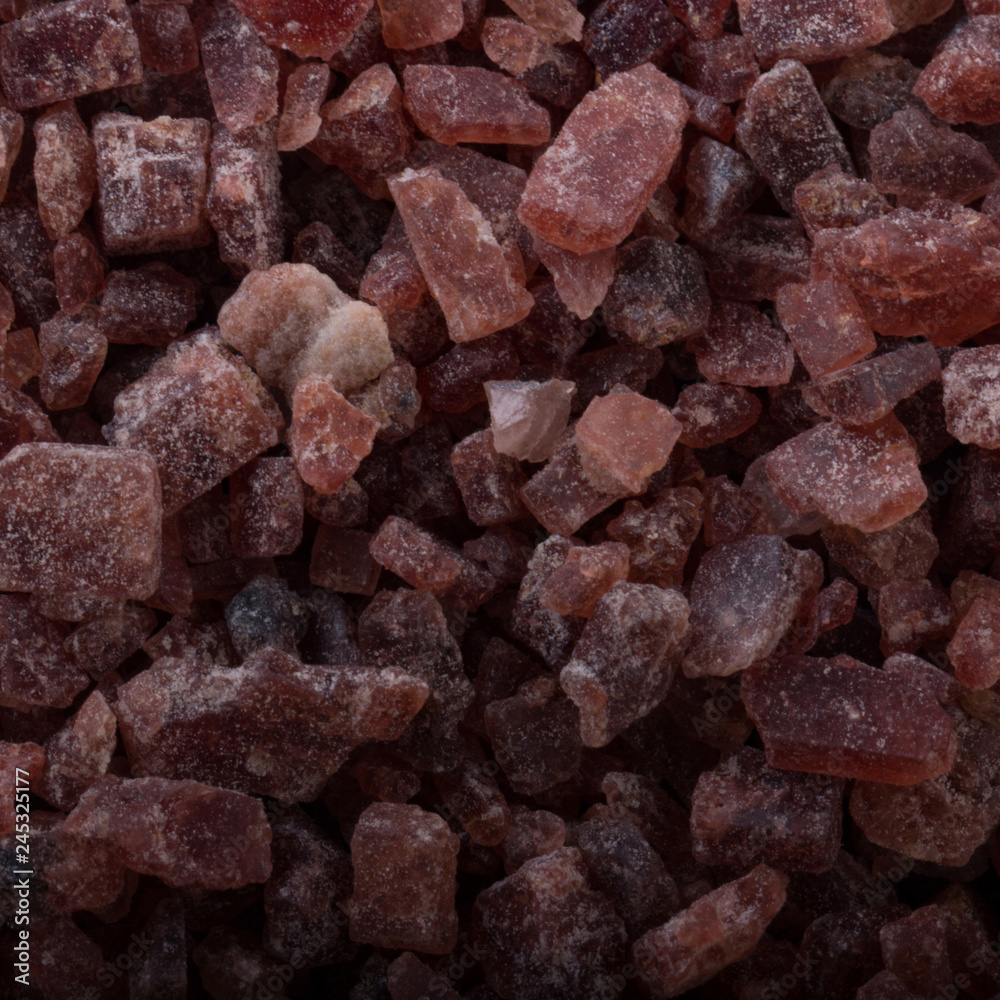 Kala namak background. black indian salt. Kala namak background. black indian salt.