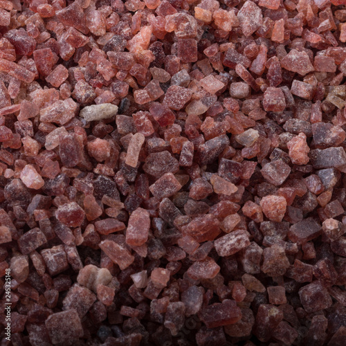 Kala namak background. black indian salt. photo