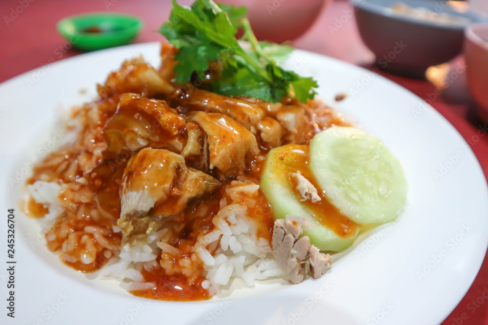 rice topped with grilled pork and gravy rice topped with grilled pork and gravy