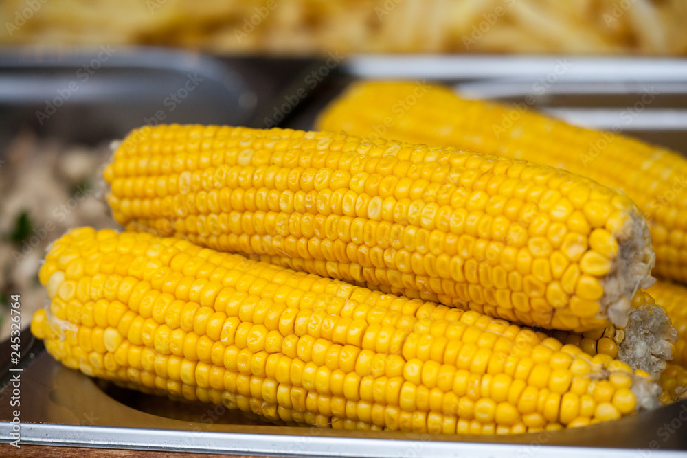 Organic boiled Corn. Vegetables cooked on the fair. Organic boiled Corn. Vegetables cooked on the fair.