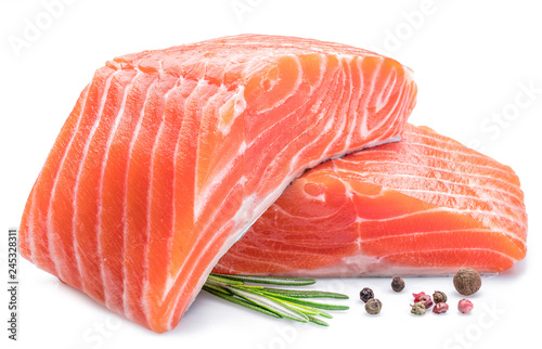Stampa su tela Fresh raw salmon fillets on white background.