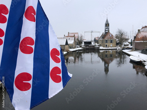 Frisian flag in Hindeloopen during winter photo