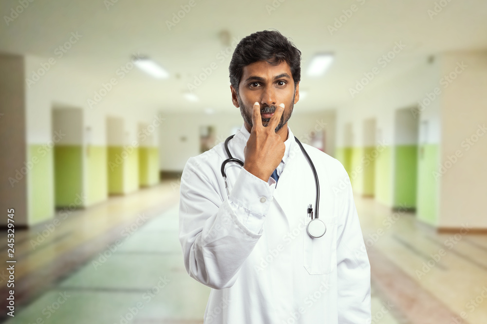 Doctor pointing at eyes as watching you concept. Doctor pointing at eyes as watching you concept.