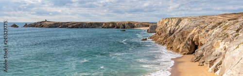 French landscape - Bretagne. A beautiful beach with wild cliffs in the background. Panoramic view.