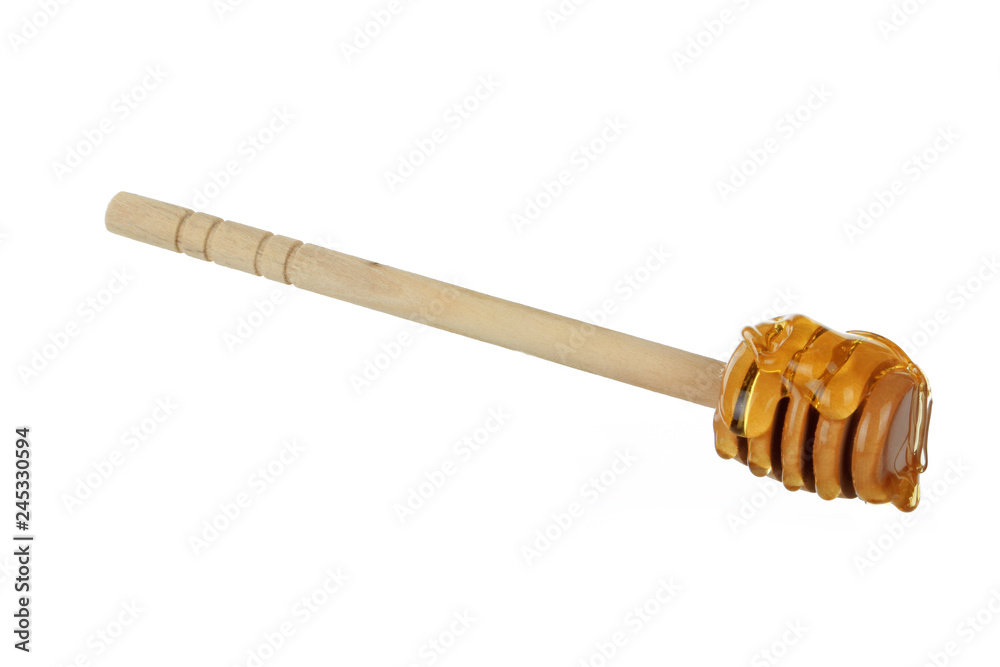 wooden spoon with honey isolated on white background wooden spoon with honey isolated on white background