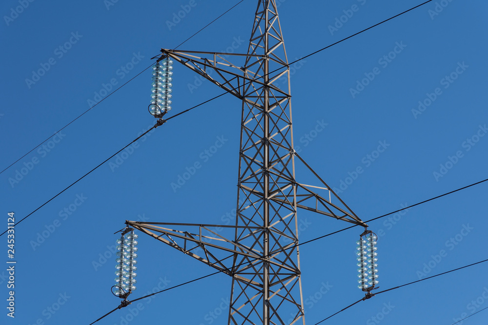 cultivated field and poles of electric current cultivated field and poles of electric current