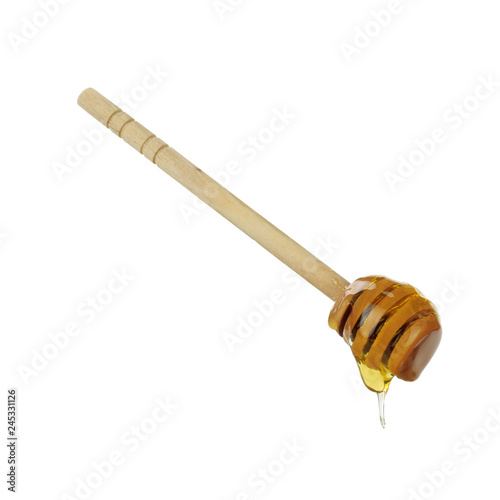 wooden spoon with honey isolated on white background