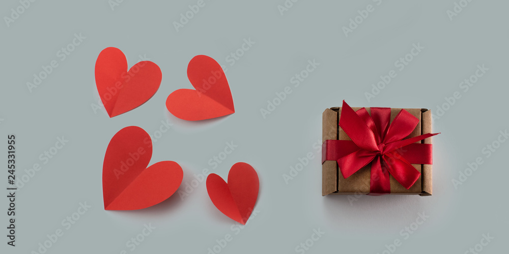 Red paper hearts gray background concept of Valentine's day