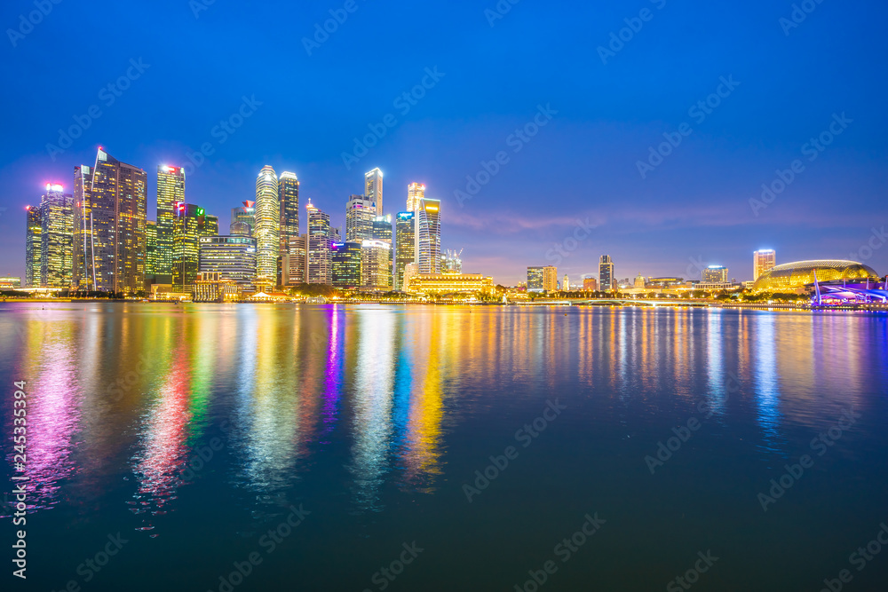 Naklejka premium Singapore - 18 Jan 2019 : Beautiful architecture building landmark exterior in the city skyline at twilight and night time