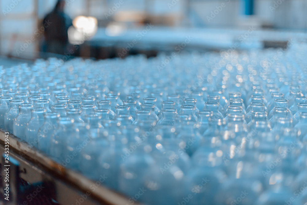 Fototapeta premium Plant for the production of bottles, glass plant