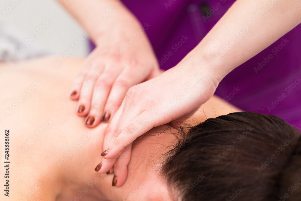Neck massage in a beauty salon Neck massage in a beauty salon