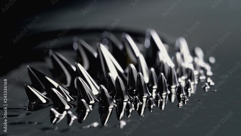 Ferrofluid. Black liquid surface. Abstract background. Ferrofluid. Black liquid surface. Abstract background.
