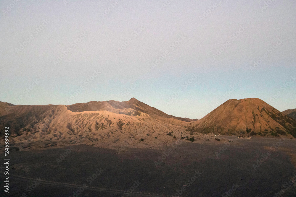 The landscape round bromo vulcano , Mount Bromo, is an active volcano, Tengger Semeru National Park, East Java, Indonesia. The landscape round bromo vulcano , Mount Bromo, is an active volcano, Tengger Semeru National Park, East Java, Indonesia.