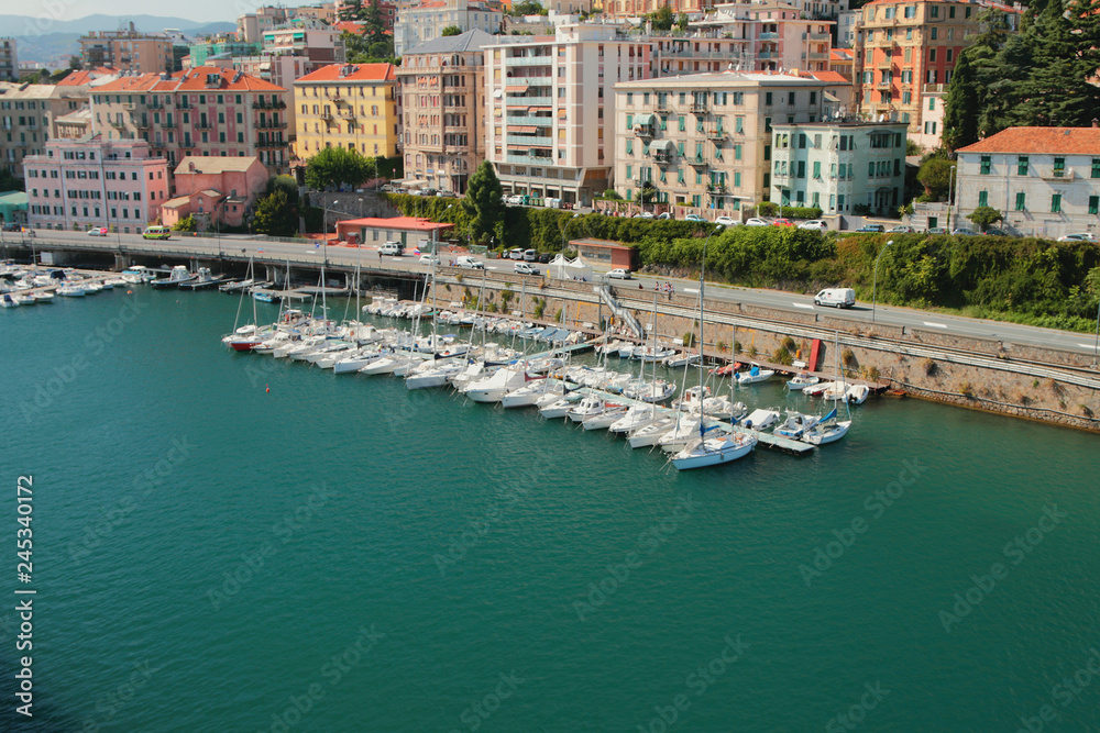 Port water area, parking for yachts and city. Savona, Italy