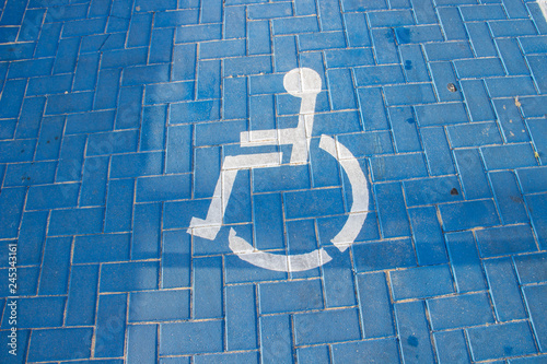 Traffic sign parking for disabled people in the parking lot