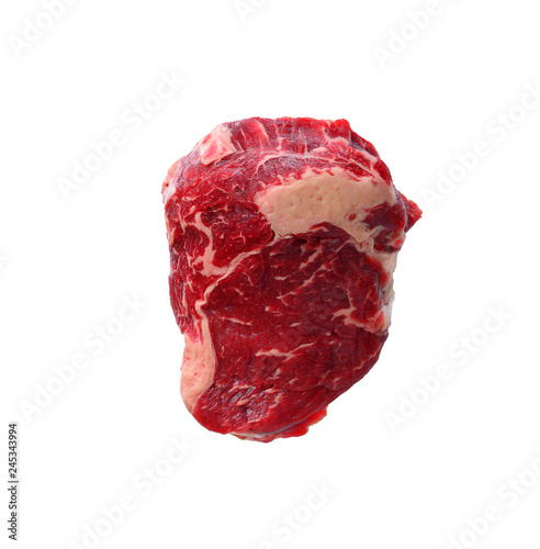 Raw marbled ribeye steak isolated on white