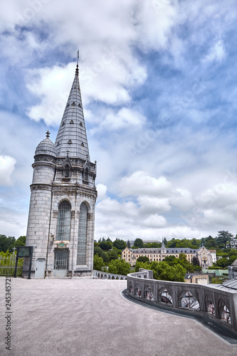 Lourdes, France: The Sanctuary of Our Lady of Lourdes is one of the largest pilgrimage centers in Europe. Detail of the architecture of the basilica