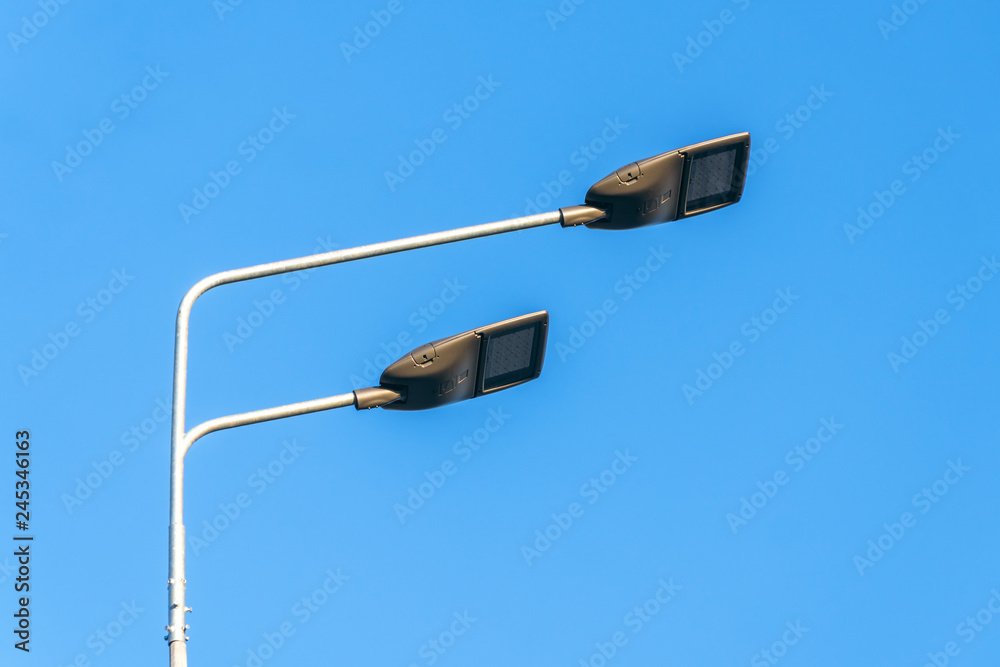 street lighting, supports for ceilings with led lamps. concept of modernization and maintenance of lamps, place for text, day street lighting, supports for ceilings with led lamps. concept of modernization and maintenance of lamps, place for text, day