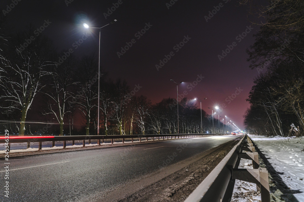 street lighting, supports for ceilings with led lamps. concept of modernization and maintenance of lamps, place for text, night. winter season. energy-saving lamps, safety of movement