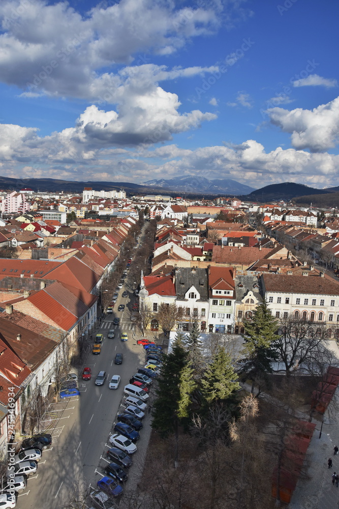Obraz premium Bistrita, view from Evangelical Church , February 2016, Romania- Mountains of Bargau- Biserica Orthodoxa Coroana - Bistrita, 